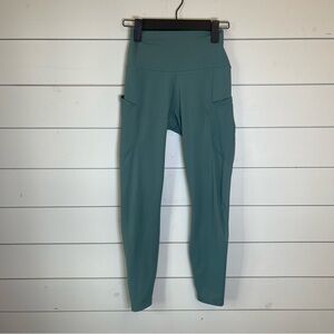 Nike dri-fit Teal High-Waisted Leggings with Pockets women’s size small